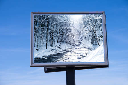Winter landscape on billboardの写真素材