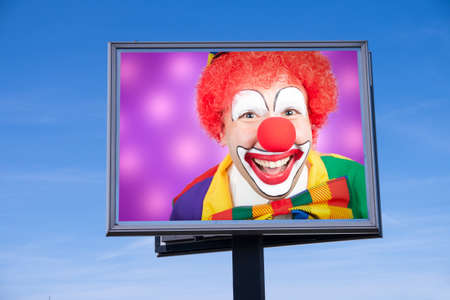 Clown on billboardの写真素材