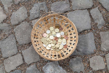 Euro coins in a basketの写真素材