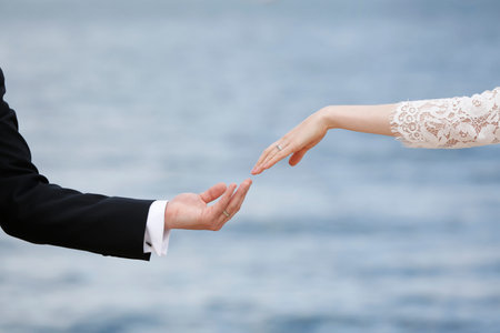 close up man and woman hand touchingの写真素材