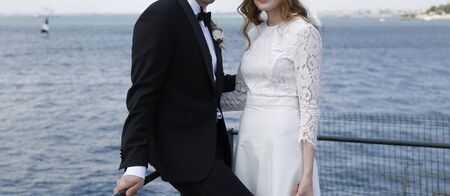 Happy bride and groom. Wedding day on the beachの写真素材