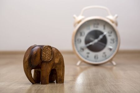 Elephant Statue on the wooden floorの写真素材