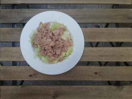 tuna salad on wooden background. Selective focusの写真素材
