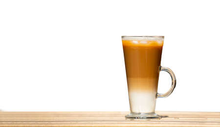 Closeup one glass with ice latte on wooden table. Selective focusの写真素材