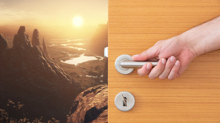 Male hand opens the door with a maze. The concept of solving problems.の素材