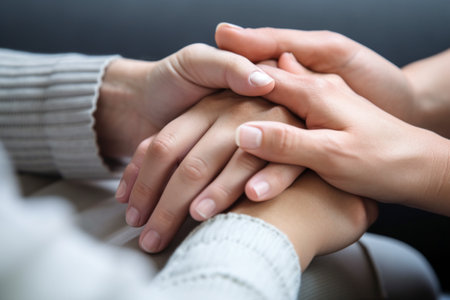 two people holding handsの素材