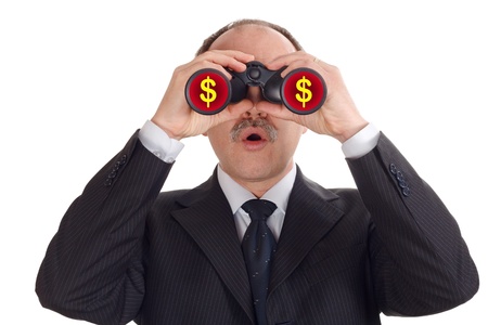 Astonished businessman looking through binoculars-isolated on whiteの写真素材