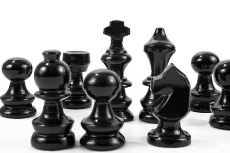Black chess pieces on white backgroundの写真素材