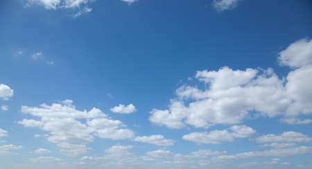 Panorama of a blue sky with some cloudsの写真素材