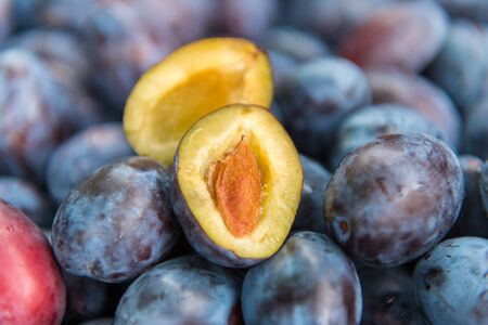 Background of fresh ripe healthy plums.の写真素材