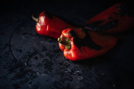 Roasted red peppers aligned on the grill. Selective focus.の写真素材
