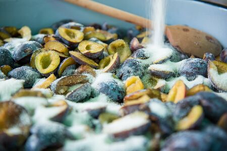 Making plum jam for the next season. Selective focus.の写真素材