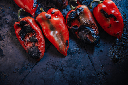 Roasted red peppers aligned on the grill. Selective focus.の写真素材