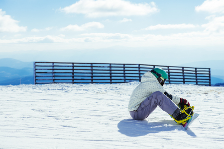 Shot of a man enjoying a day out skiing on a mountain.の写真素材