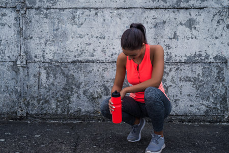 Attractive woman making a break for refreshment.の写真素材