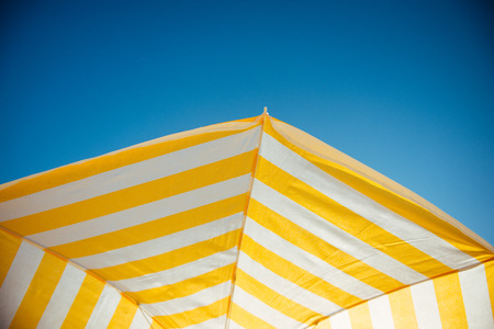 Shot from above of an umbrella and the sky.の写真素材