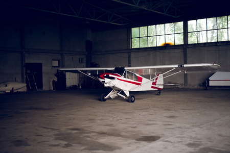 Photo of a plane in the garage.の写真素材