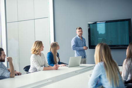 Handsome businessman making a presentation in the conference room.の写真素材