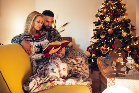 Reading book together.の写真素材