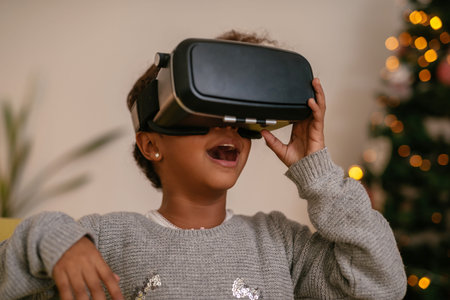 Beautiful young african american girl tying VR headset.