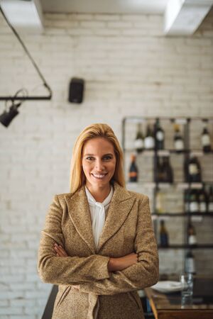 Portrait of attractive young businesswoman with crossed arms.の写真素材