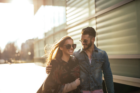 Couple in love enjoying a walk on a sunny spring day.