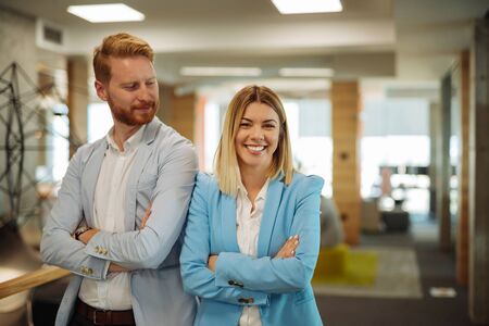 Portrait of two business people at work.の写真素材