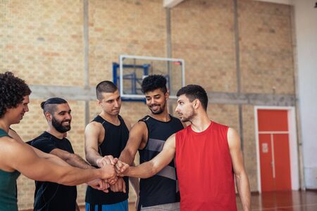 Portrait of basketball teammates on the court.の写真素材