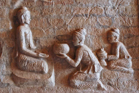 Bas relief of a scene of the Buddhas life.の写真素材