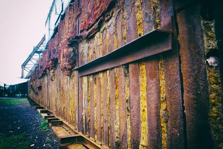 Photograph of an old rusty grunge looking wallの写真素材