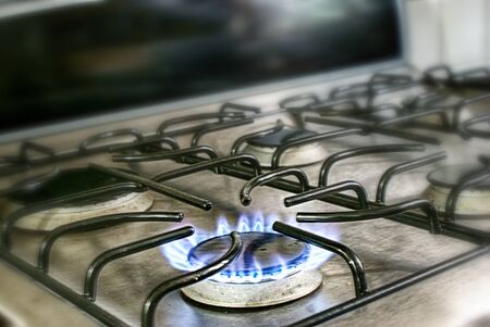 Photograph of a gas stove blue fire flameの写真素材