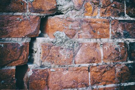 Photograph of a red brick wall textureの写真素材
