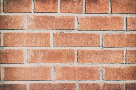 Photograph of a red brick wall textureの写真素材