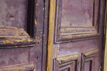 Photograph of an old purple wood doorの写真素材