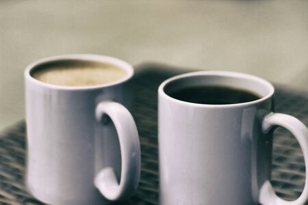 Photograph of a pair of cups of coffeeの写真素材