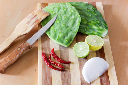 Photograph of some fresh vegetables on a wood tableの写真素材
