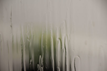 Photograph of a wt window under the rain