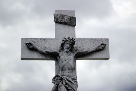 Photograph of a stone crucifix statueの写真素材