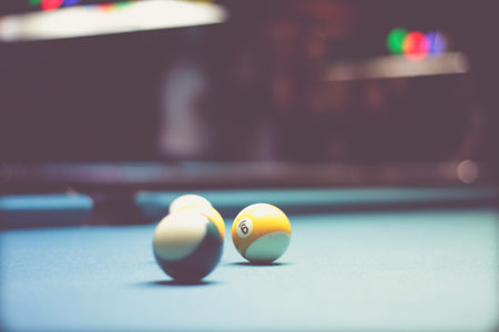 Photograph of some billiards plastic balls on tableの写真素材