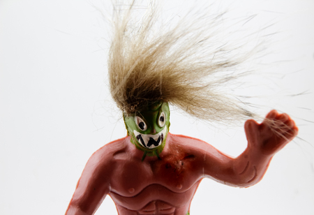 Photograph of a green toy mexican wrestlerの写真素材