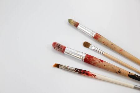 Photograph of some art dirty brushesの写真素材