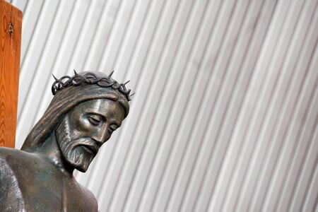 Photograph of a metal Jesus Christ in th einterior of Basilica de Guadalupe in Monterrey Mexicoの写真素材