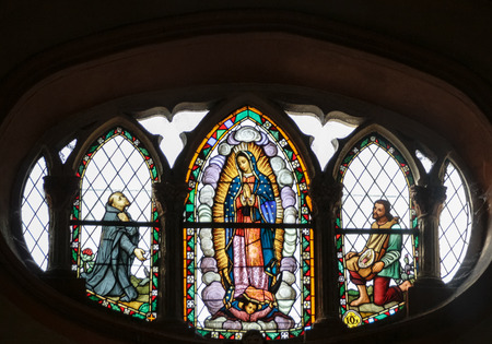 Photograph of a stained glass window in Basilica de Guadalupe temple in Monterrey Nuevo Leon Mexicoのeditorial素材