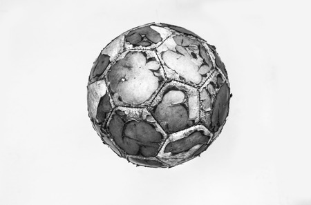 Photograph of an old soccer ballの写真素材