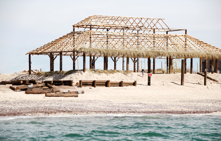 Photograph of a house in construction at the beachの写真素材