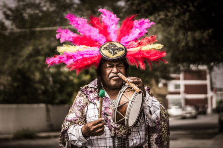 MONTERREY, NUEVO LEON / MEXICO - 11 12 2017: Mexican traditional indigenous musician man perfomrming on streetのeditorial素材