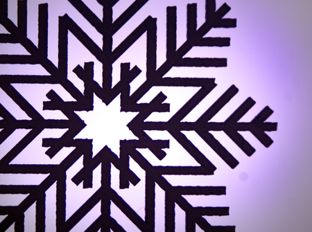 Photograph of some wood painted snowflakes symbolsの写真素材