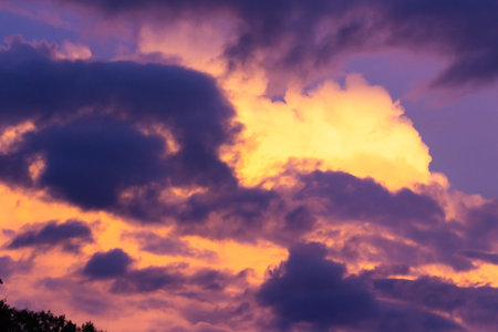 Photograph of a purple and yellow cloudy sky