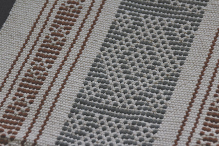 Photograph of an abstract traditional mexican textile texture or background