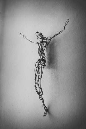 Photograph of a metal wire figure of Jesus Christの写真素材